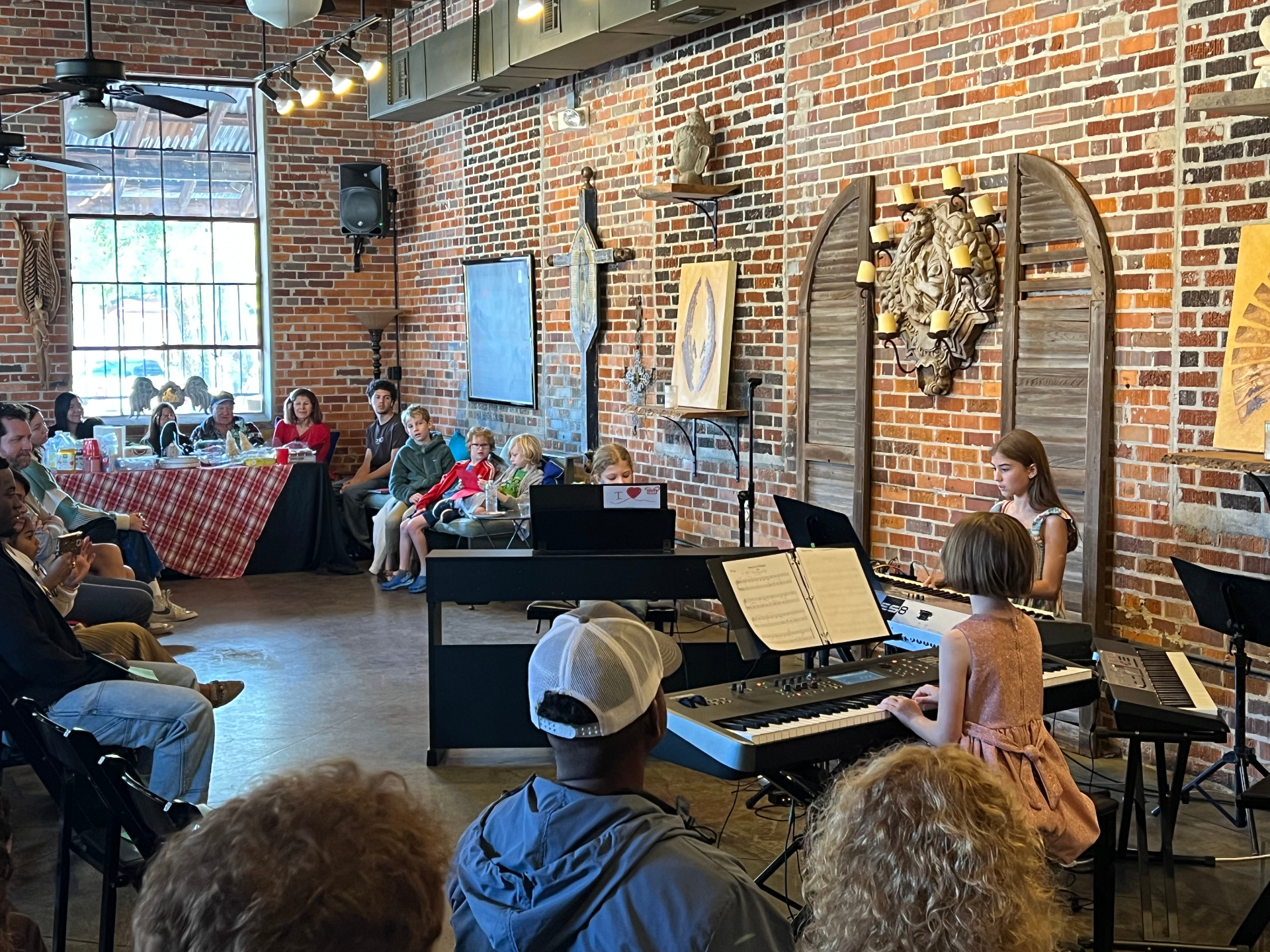 Students performing in the keyboard ensemble