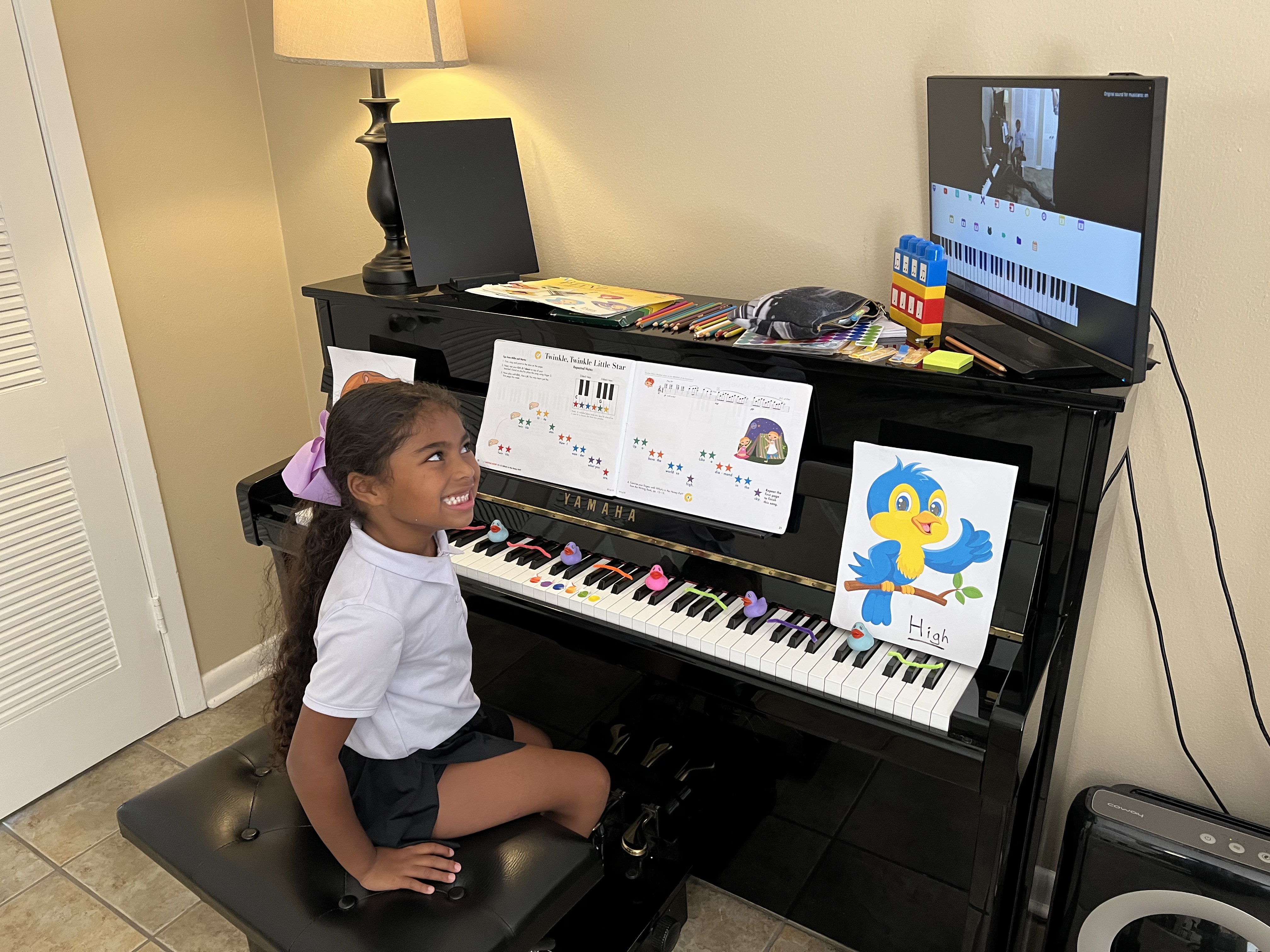 Student at a keyboard in the studio
