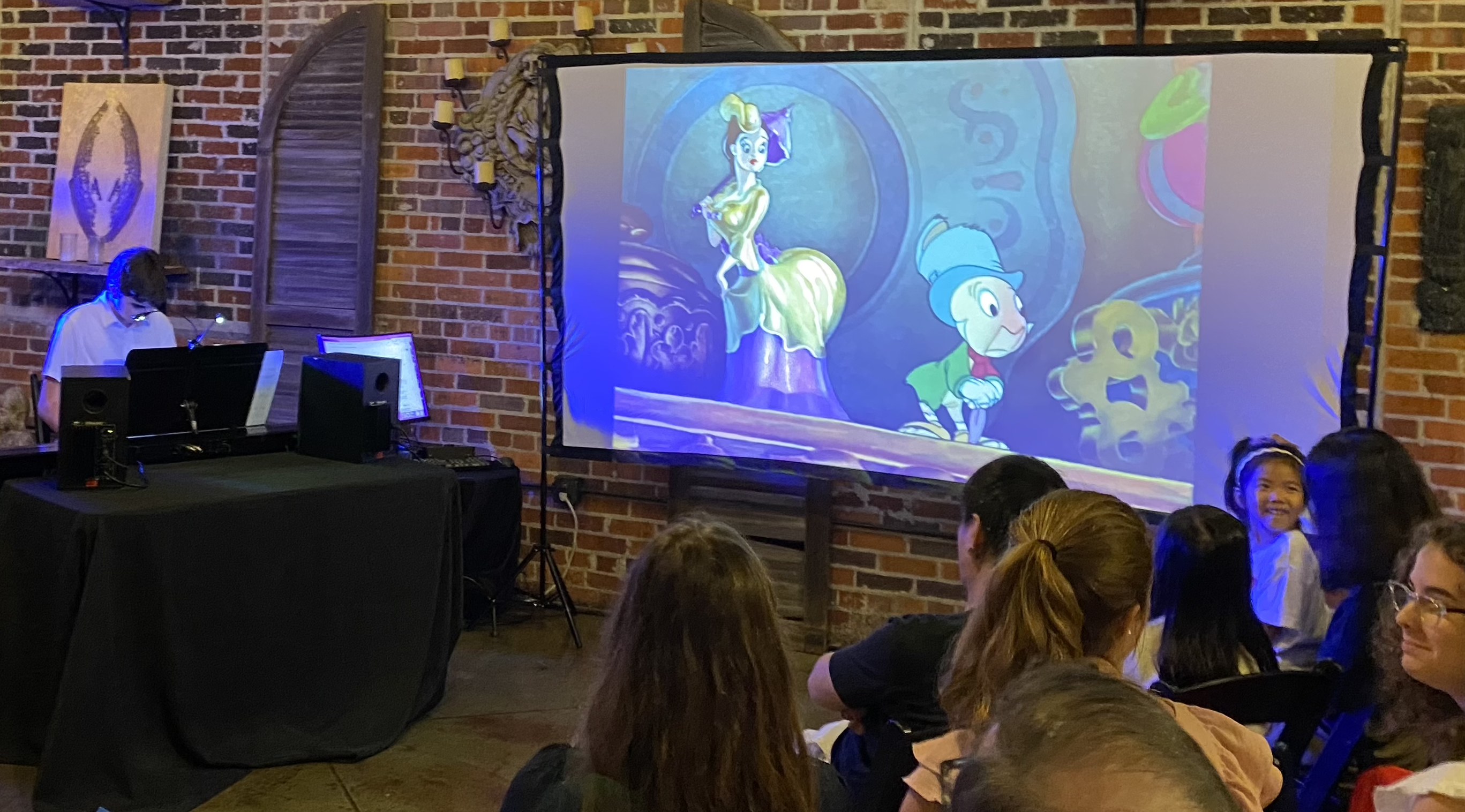 Student performing Pinocchio piece at the Movie Music Concert